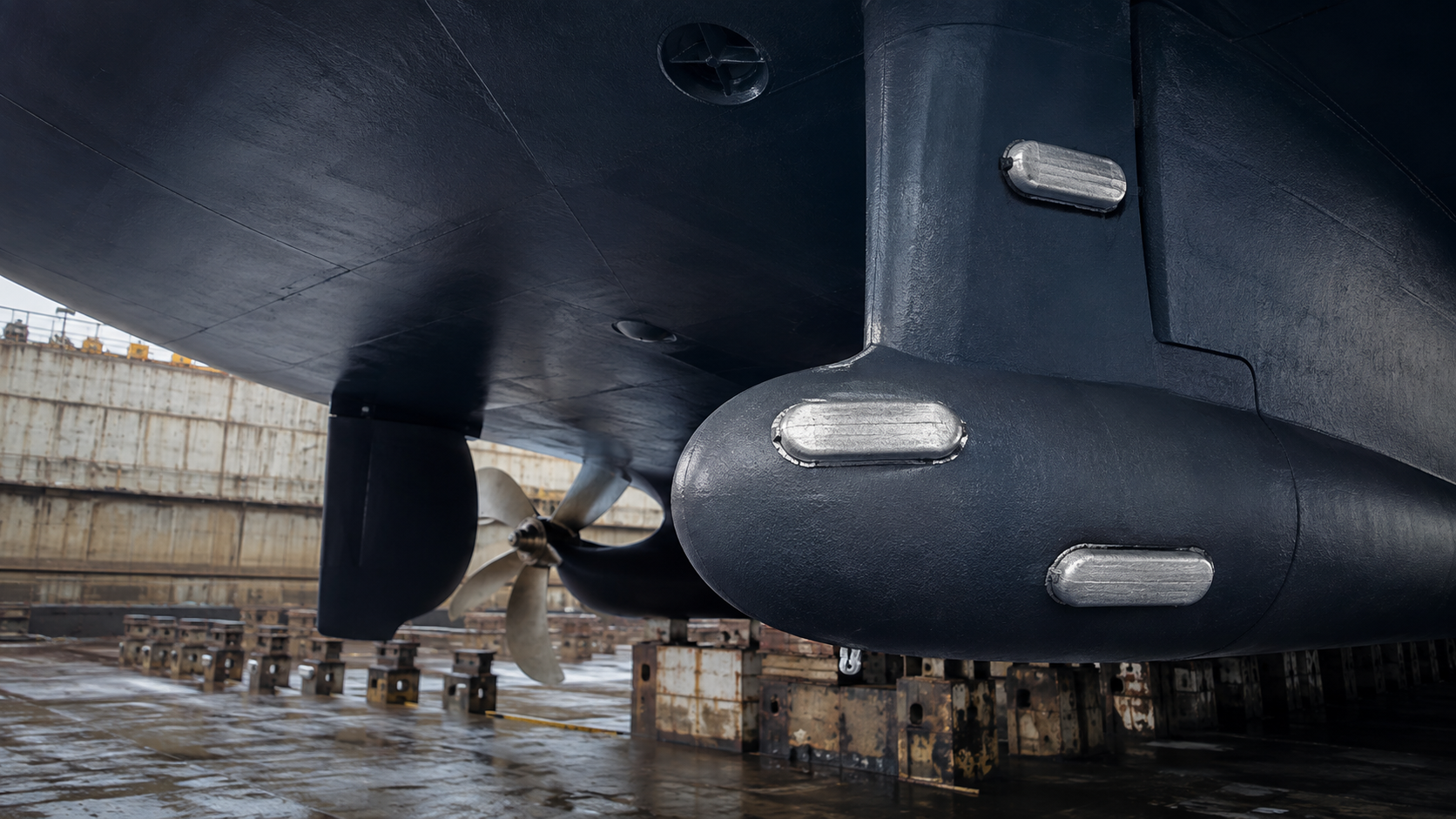 Sacrificial anodes fitted to a vessel hull and rudder horn in drydock